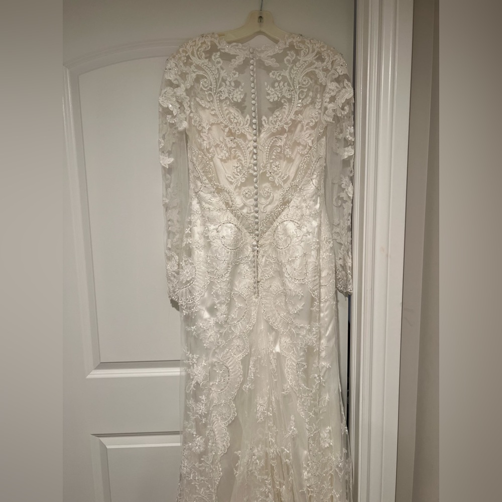 Casablanca Tulip Imperial Gown
Style 2232L
Size 12 
NEVER WORN NEW WITH TAGS